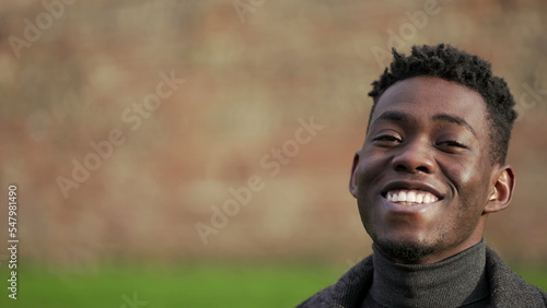 Happy elegant black African man smiling outside2