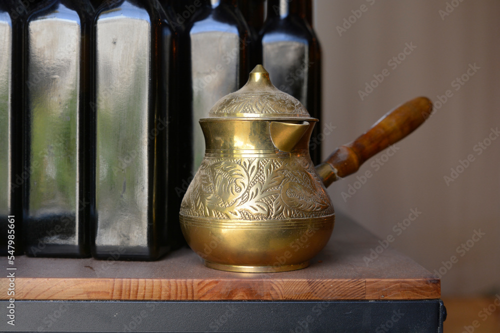 Two traditional Moroccan gold teapots Two traditional Moroccan gold teapots