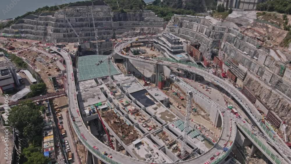 Drone flying revealing the Tseung Kwan O - Lam Tin Tunnel Construction of Highway and bridge. Drone flying revealing the Tseung Kwan O - Lam Tin Tunnel Construction of Highway and bridge.