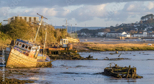Ships, wrecks of boat on River Torridge Estuary near Appledore, Devon in morning light. photo