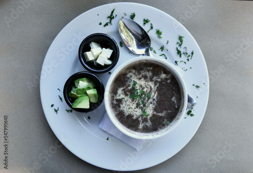 Sopa de Frijoles negros con Queso y Aguacate. Comida tipica de Guatemala. photo