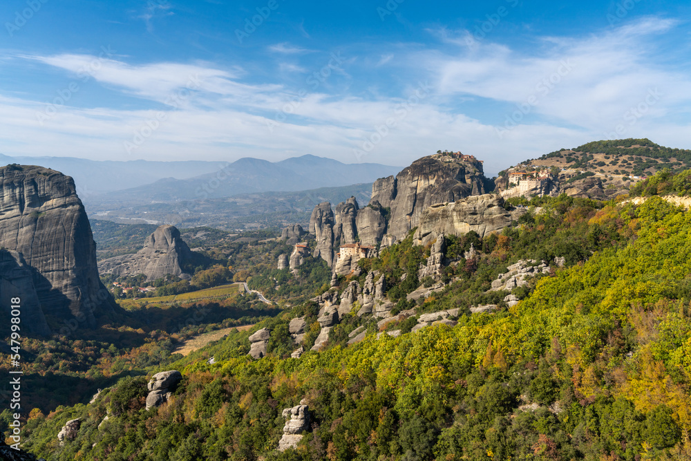 landscape of the Meteora rock formations with the famous monasteries on the hilltops