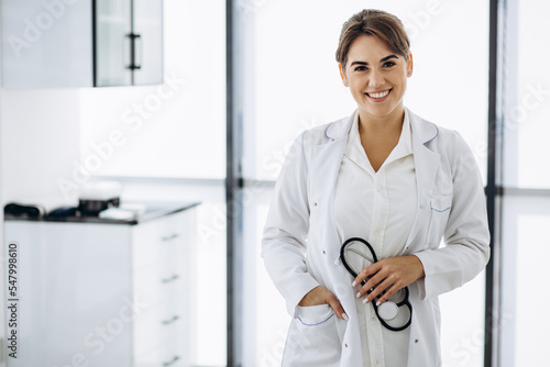 Portrait of woman doctor with stethoscope photo