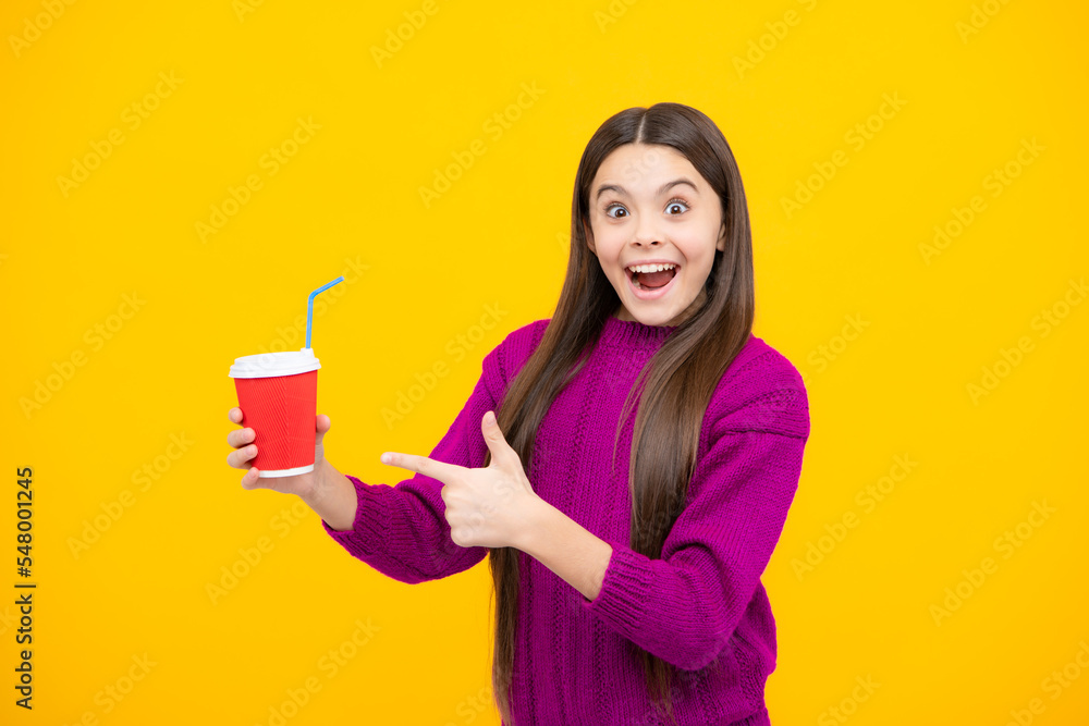 School girl with take away cup of cappuccino coffee or tea. Child with plastic takeaway mug, morning drink cocoa beverage. Excited face. Amazed expression, cheerful and glad. School girl with take away cup of cappuccino coffee or tea. Child with plastic takeaway mug, morning drink cocoa beverage. Excited face. Amazed expression, cheerful and glad.
