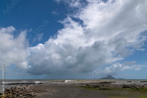 Whakatane river mouth with storm clouds photo