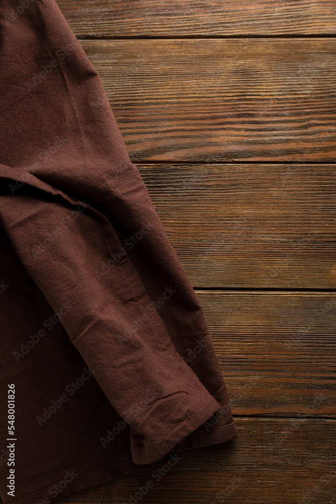 Top view of kitchen fabric on wooden backdrop Top view of kitchen fabric on wooden backdrop