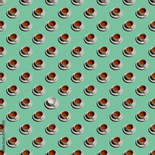 Pattern with lonely cup of tea and many empty cups