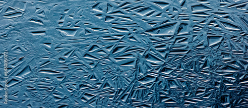 Thin ice textures on water, blue color ice textures