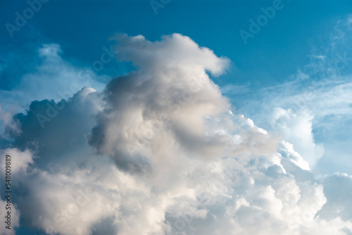 View above the clouds during daytime. Cloudscape natural scene with cumulus on a sunny day