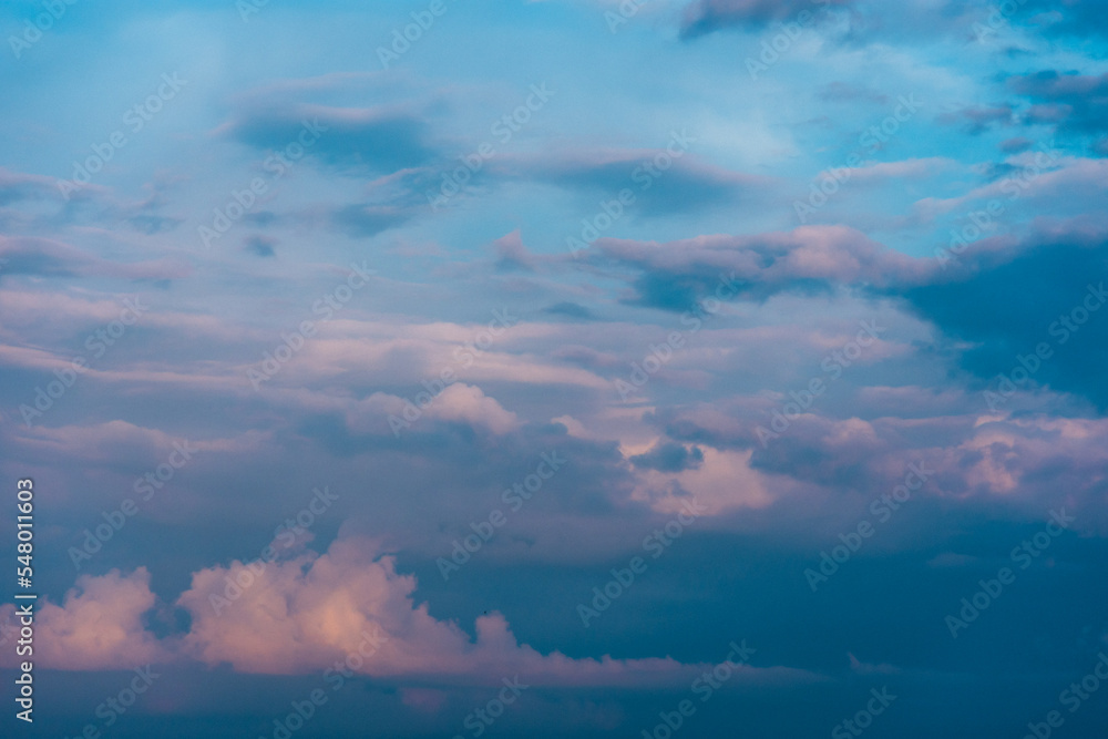 Obraz premium Colorful cloudscape during sunset or sunrise. Dusk or dawn dramatic sky with clouds
