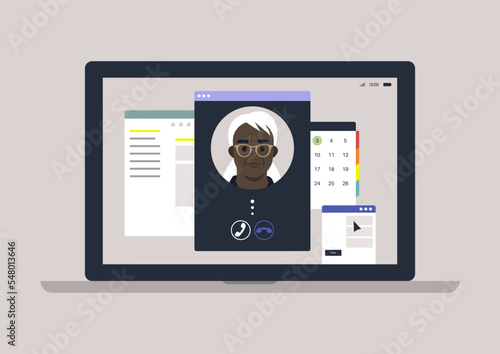 A video call from older parent or supervisor, a laptop screen with program windows overlapping