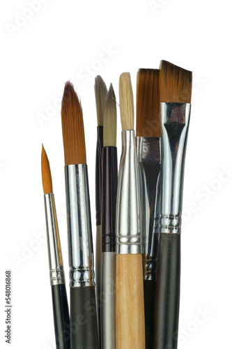 Various professional paint brushes isolated on white background