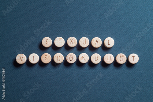 Sexual misconduct - word concept on cubes