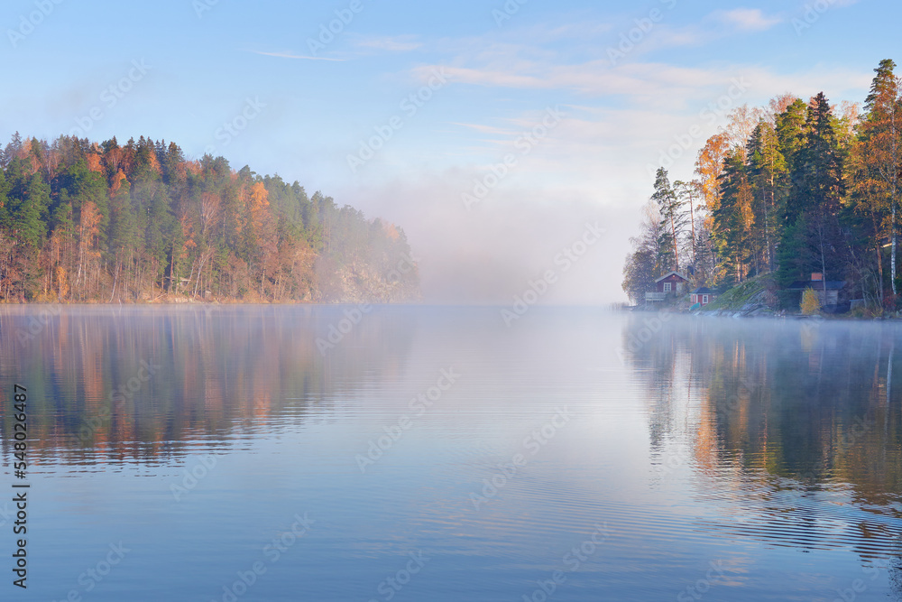 Fog on shores of Finnish Tuusula lake: morning, autumn, calm.