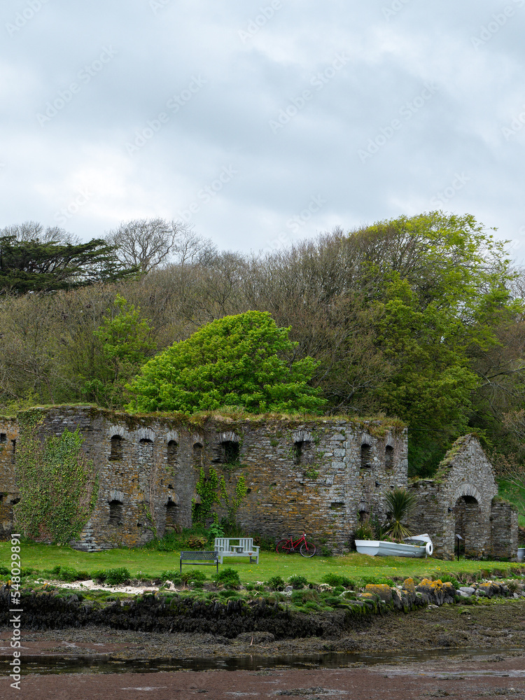 The Arundel grain store, shore of Clonakilty Bay. An stone building in Europe. Historical architectural monument, landscape. Tourist attractions in Ireland