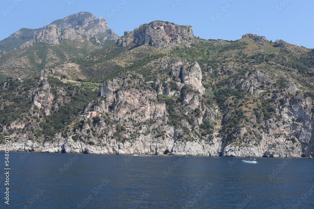 view of the sea and mountains. view of the coast of island. coast of the region. landscape with mountains and sea. landscape with blue sky and clouds. sea and rocks