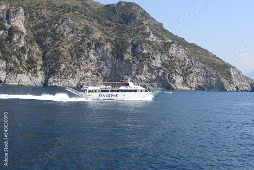 luxury yacht in the sea. swimmingf the promende boat with passengers. boats in the bay. ship in the sea