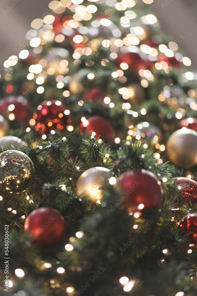 Christmas tree indoor, lights bokeh around, Christmas atmosphere, Christmas holidays banner Christmas tree indoor, lights bokeh around, Christmas atmosphere, Christmas holidays banner