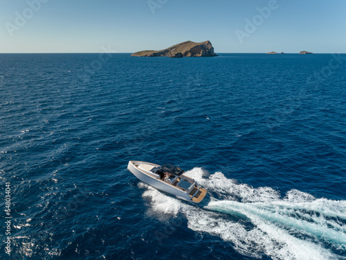 Motor Boat Tender Speeding Through the Ocean in the Summer © Stock87