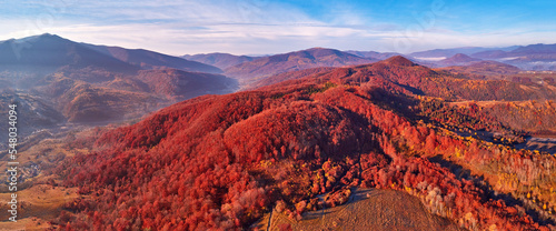 Obraz na płótnie November mountain panorama. Mountain autumn misty Sunrise landscape. Morning valley covered by fog aerial scene. Seasonal fall scenery of Carpathian range w salonie