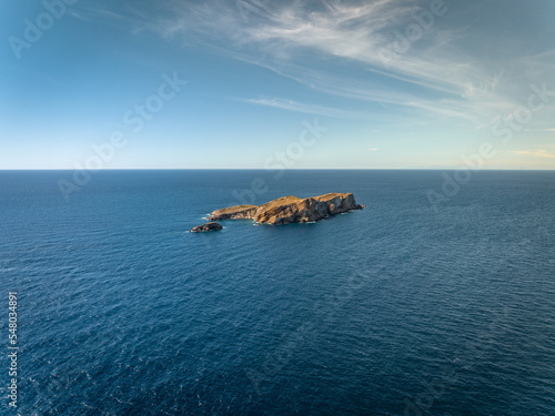 Small Island Off the Shore of Ibiza in the Summer