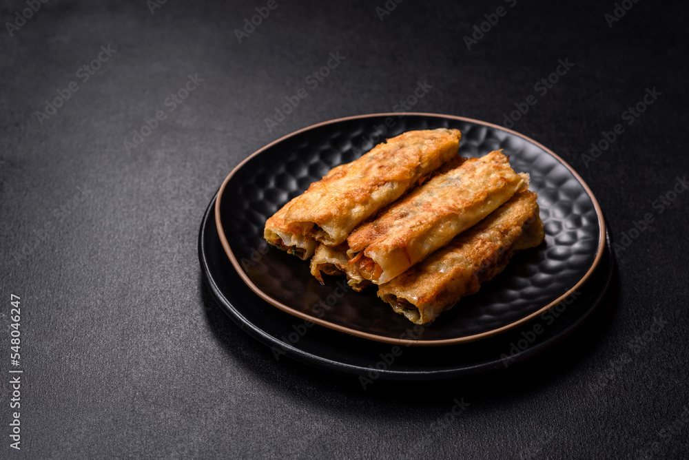 Fresh bite rolls from leaves of cabbage with minced meat, onions and carrots Fresh bite rolls from leaves of cabbage with minced meat, onions and carrots
