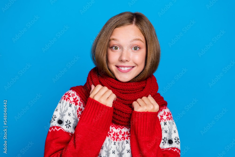 Photo of adorable pretty cute lovely lady wear stylish comfort clothes enjoy frosty weather outside isolated on blue color background Photo of adorable pretty cute lovely lady wear stylish comfort clothes enjoy frosty weather outside isolated on blue color background