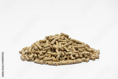Fraction of feed additives for animals on a white background in the form of a pyramid