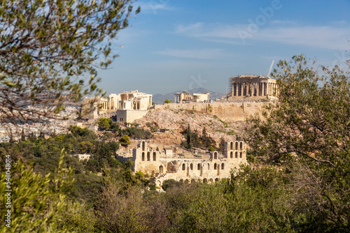 Historic Landmark, Odeon of Herodes Atticus, in the Acropolis of Athens, Greece. Sunny Day viewed from Philopappos Hill.