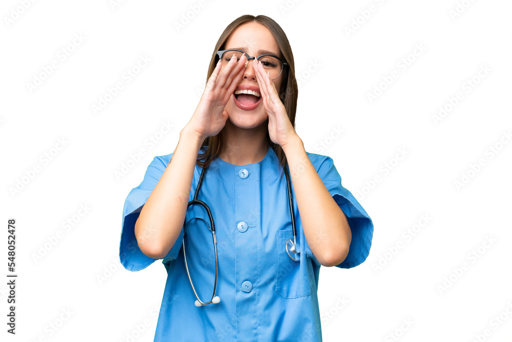 Young nurse caucasian woman over isolated background shouting and announcing something Young nurse caucasian woman over isolated background shouting and announcing something