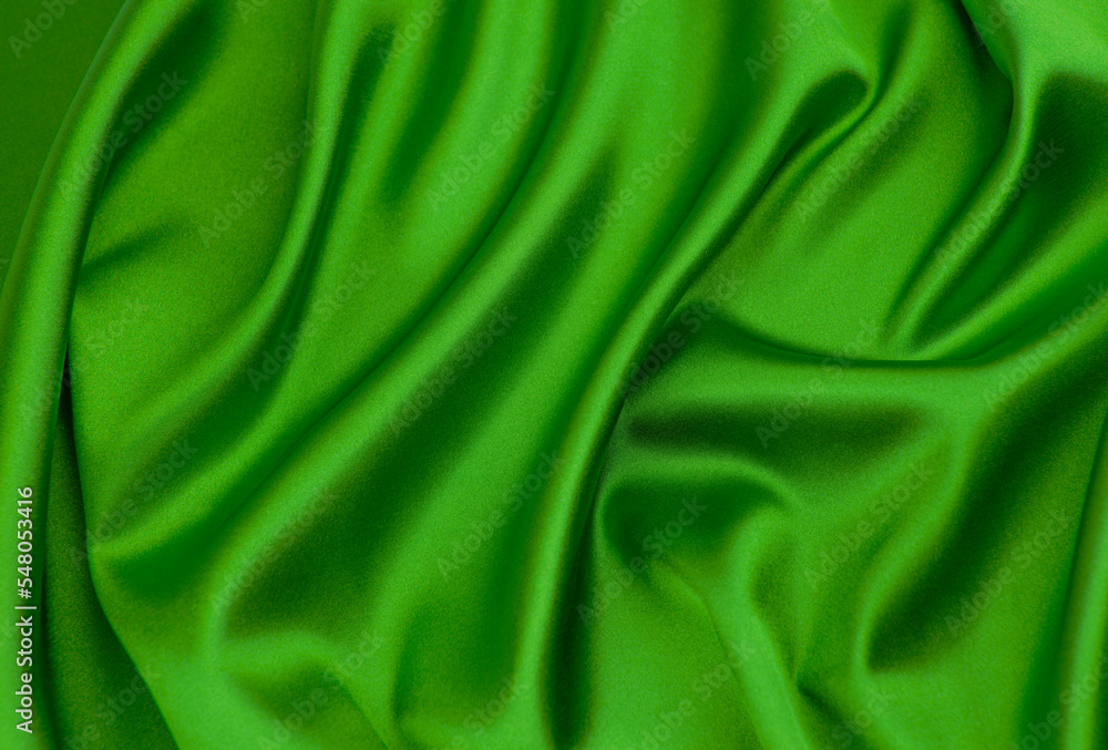 Green satin fabric as background Green satin fabric as background