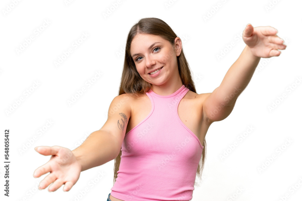 Young beautiful blonde woman over isolated background presenting and inviting to come with hand Young beautiful blonde woman over isolated background presenting and inviting to come with hand