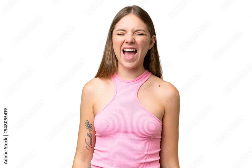 Young beautiful blonde woman over isolated background shouting to the front with mouth wide open Young beautiful blonde woman over isolated background shouting to the front with mouth wide open