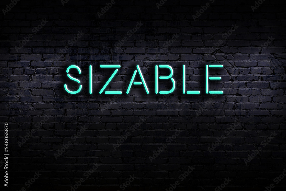 Ταπετσαρία Neon sign. Word sizable against brick wall. Night view