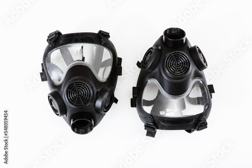 Gas mask without filter on white background. Two respirators. © Kolomiiets Viktoriia