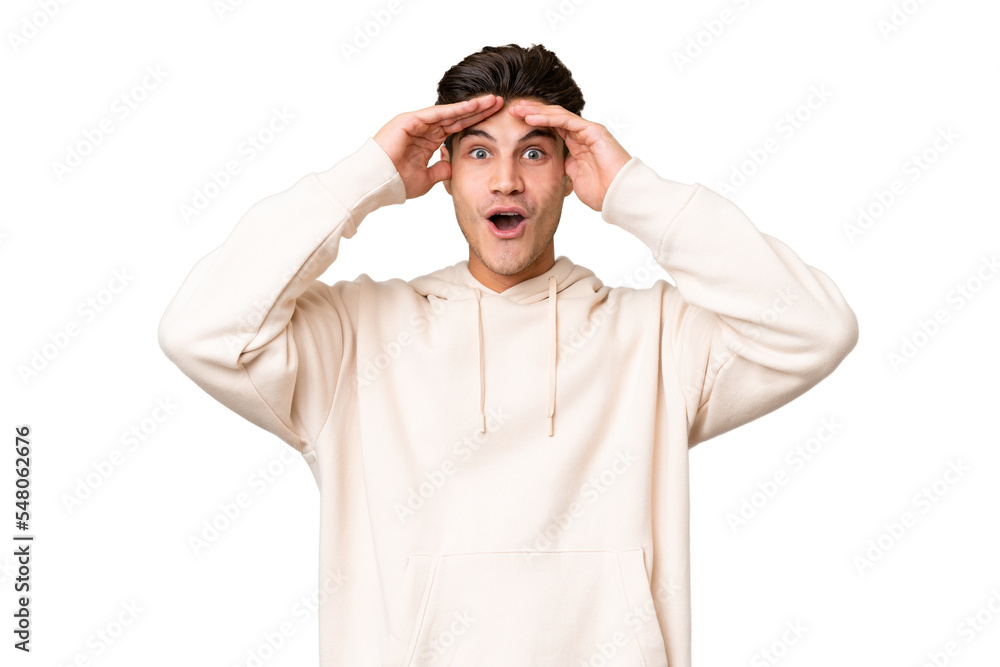 Young caucasian handsome man over isolated background with surprise expression Young caucasian handsome man over isolated background with surprise expression