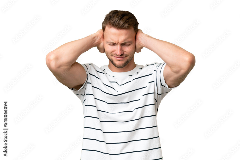 Young blonde caucasian man over isolated background frustrated and covering ears Young blonde caucasian man over isolated background frustrated and covering ears