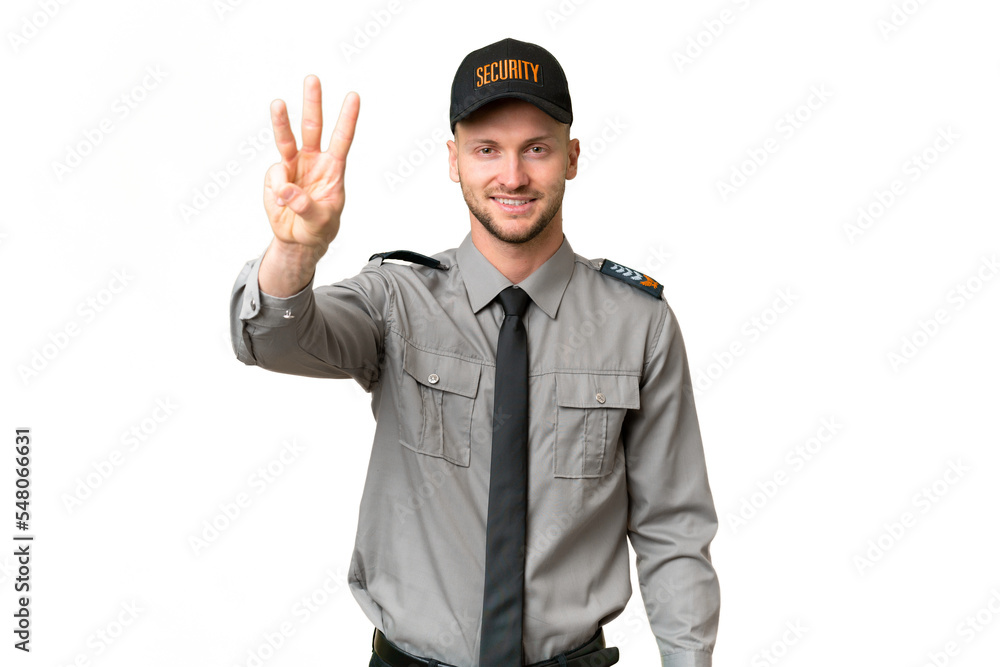 Young security caucasian man over isolated background happy and counting three with fingers Young security caucasian man over isolated background happy and counting three with fingers