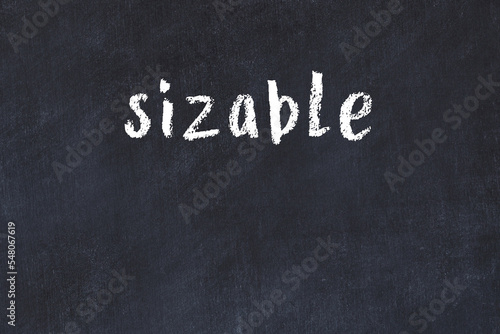 Schilderij op canvas College chalk desk with the word sizable written on in