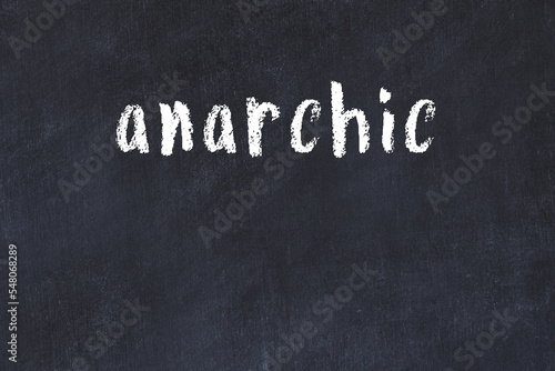 Φωτογραφία Black chalkboard with inscription anarchic on in