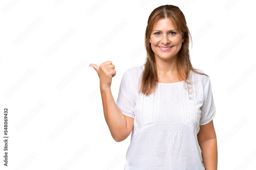 Middle-aged caucasian woman over isolated background pointing to the side to present a product Middle-aged caucasian woman over isolated background pointing to the side to present a product