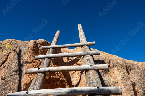 Wooden ladder on mountain photo