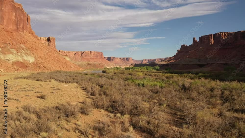 Flying through Canyonlands National Park over the Green River on a late sunny afternoon. Flying through Canyonlands National Park over the Green River on a late sunny afternoon.