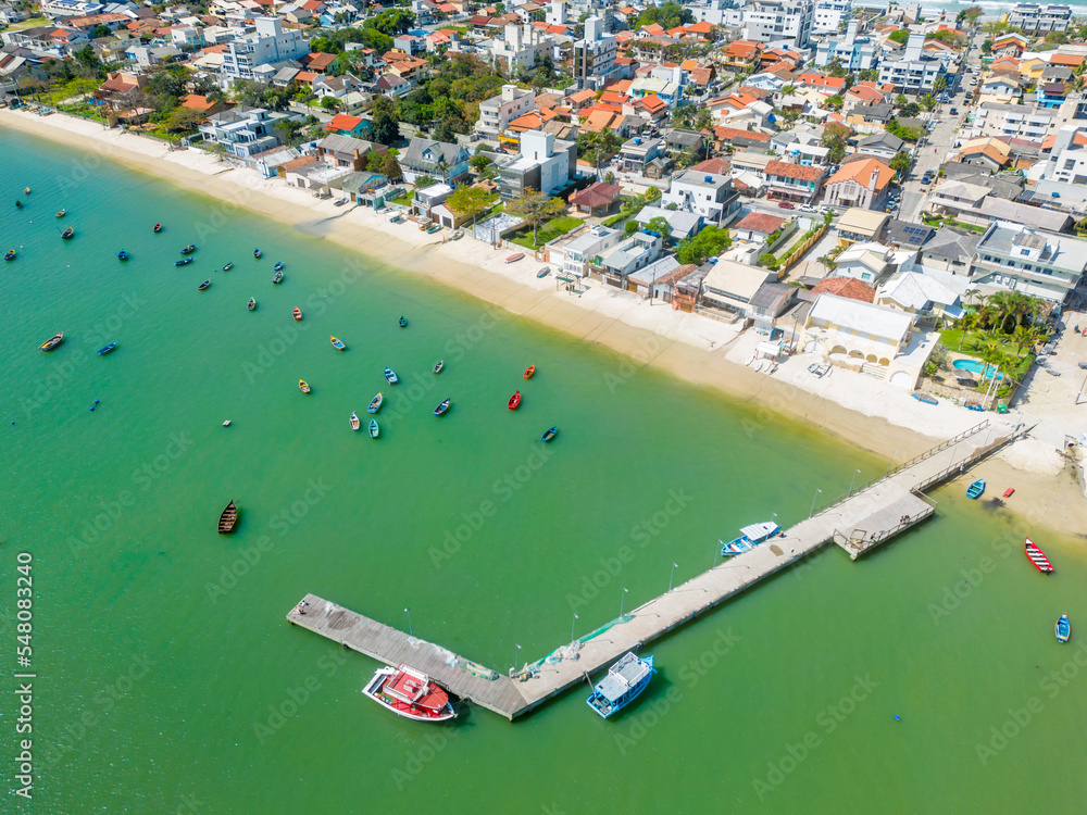 Aerial view of pier with fisherman boats