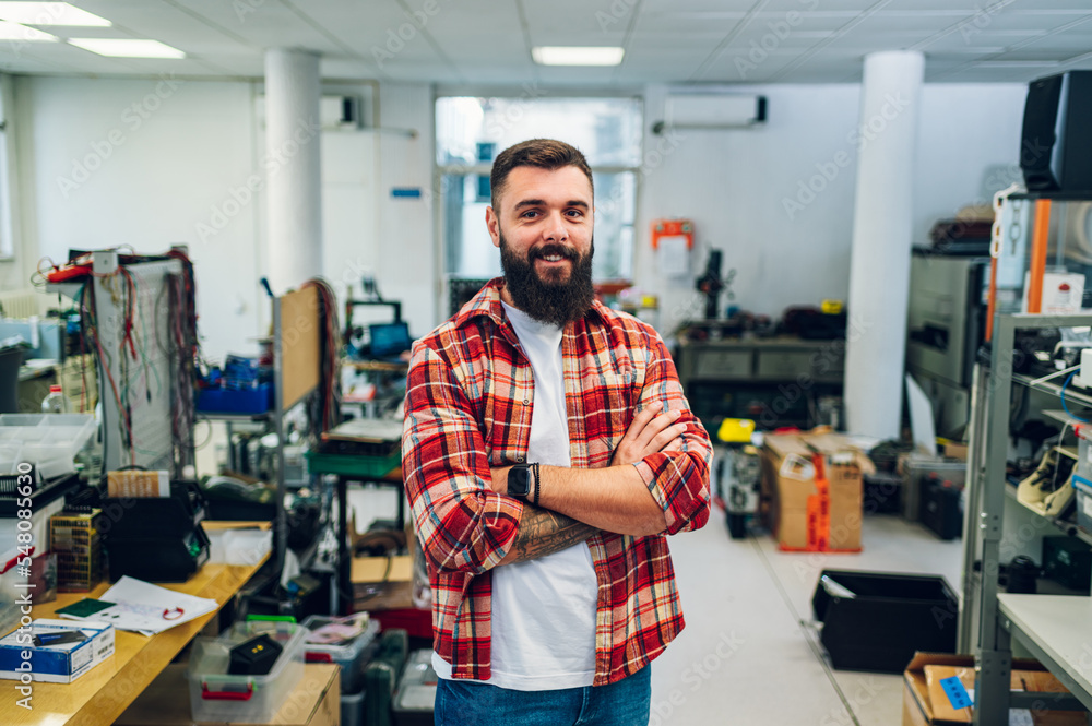 Portrait of an electronics engineer working in a workshop Portrait of an electronics engineer working in a workshop