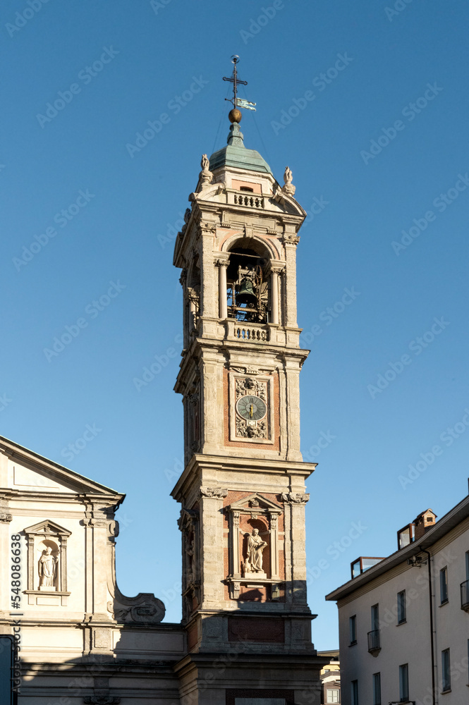 Bell tower of Saint Stephen's Basilica, church estabilished in 5th century, in Milan city center, Lombardia region, Italy 
