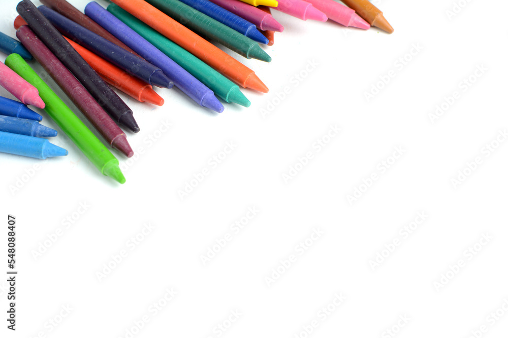 Crayons lined up isolated on white background. Crayons lined up isolated on white background.