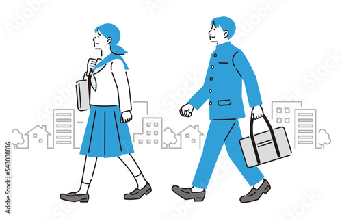 通学する中学生の男女