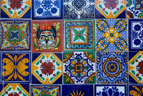 Colorful, patterned ceramic tiles on a wall in Cabo San Lucas, Mexico
