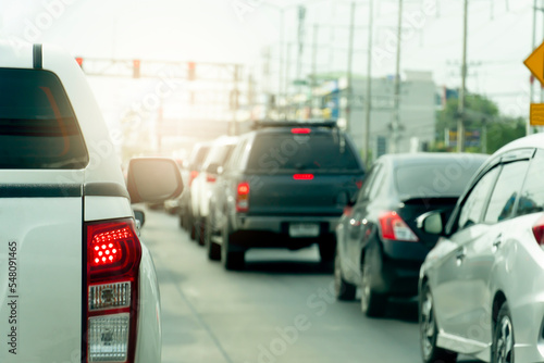 Abstract of car rear lights from brake. Cars parked close to each other during traffic jams.